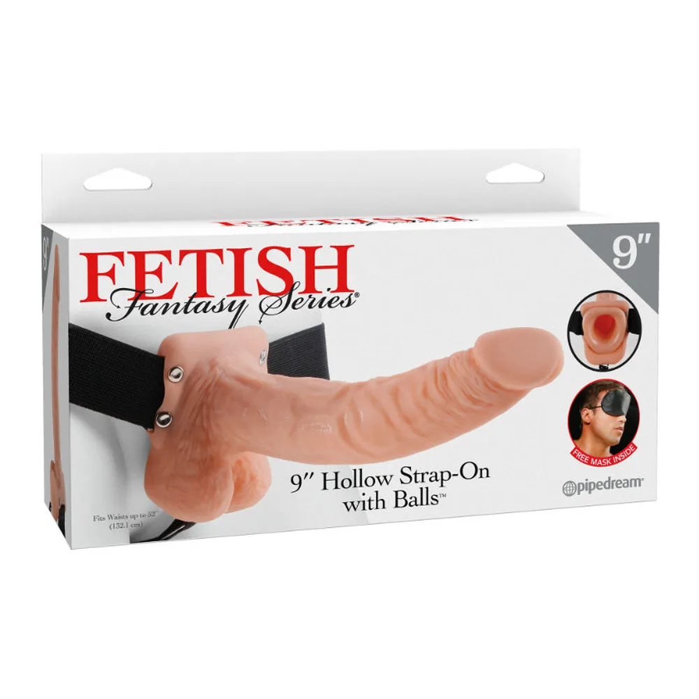 Harnais élastique noir avec sangle haute et bande frontale, équipé d'un gode creux avec testicules moulés, sur mannequin neutre de profil