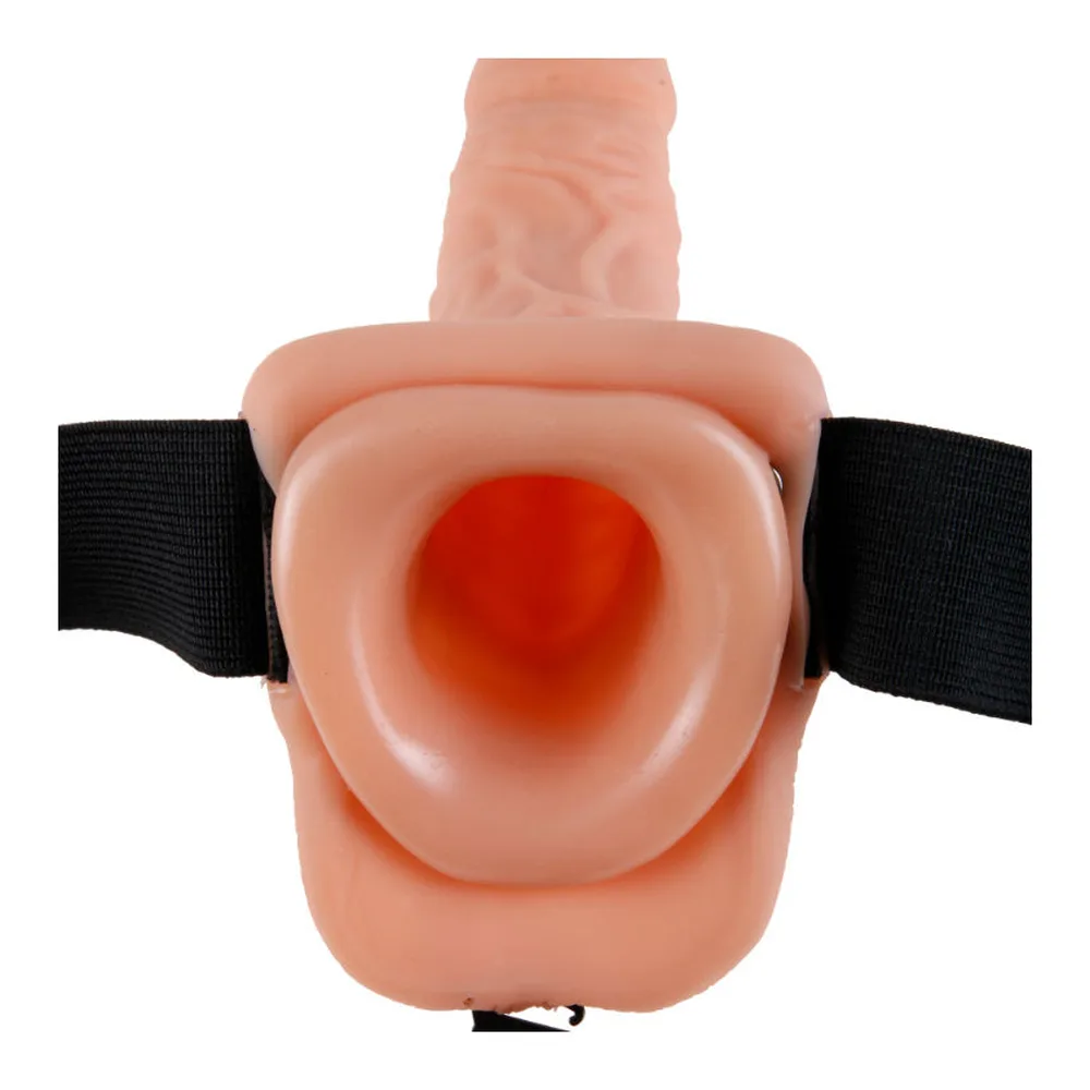 Gode-ceinture noir avec harnais élastique, vu de face sur mannequin. Silhouette de forme anatomique, sangle ajustable autour des hanches, fermoir anneau visible au centre