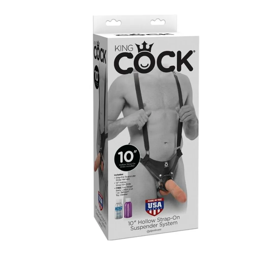 Système de suspension noir avec sangles ajustables et boucles de fixation, porté, montrant le gode creux en silicone chair inséré dans le harnais