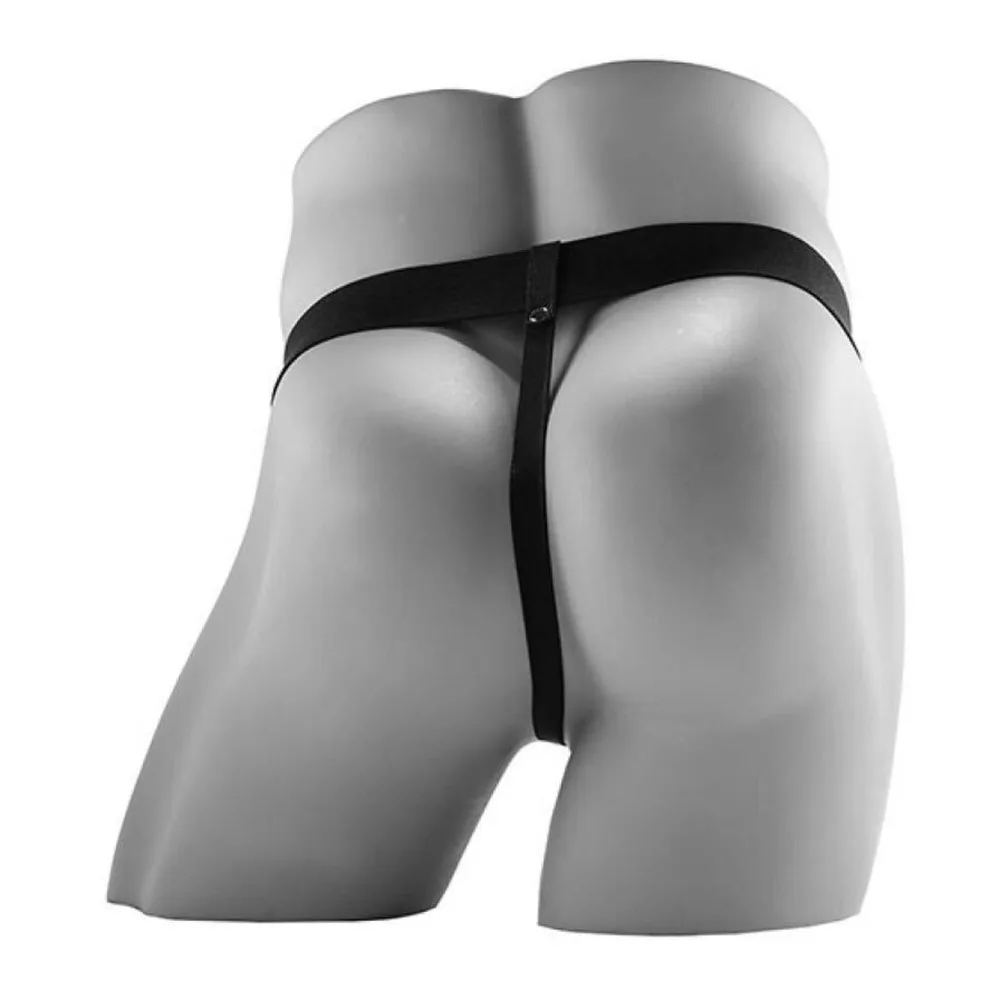 Gode creux réaliste en silicone gris clair avec testicules moulés, équipé d'un harnais noir à sangle centrale, sur fond blanc