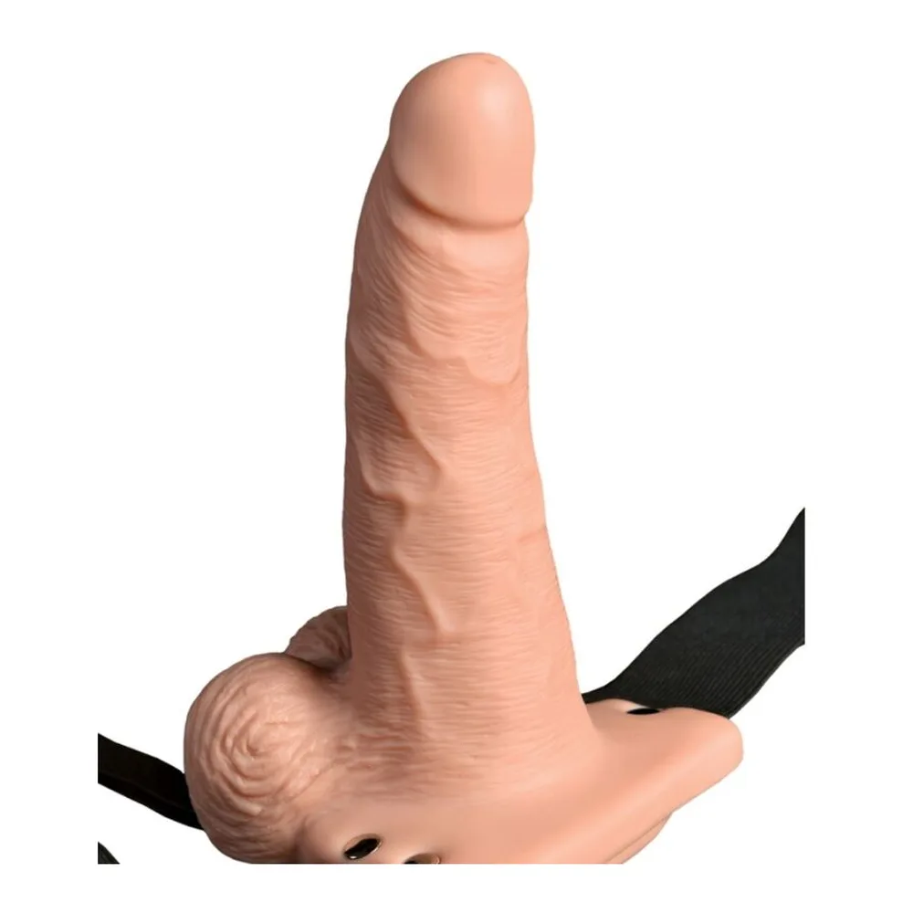 Gode creux vibrant en silicone chair avec texture réaliste, socle arrondi, présenté avec harnais élastique noir