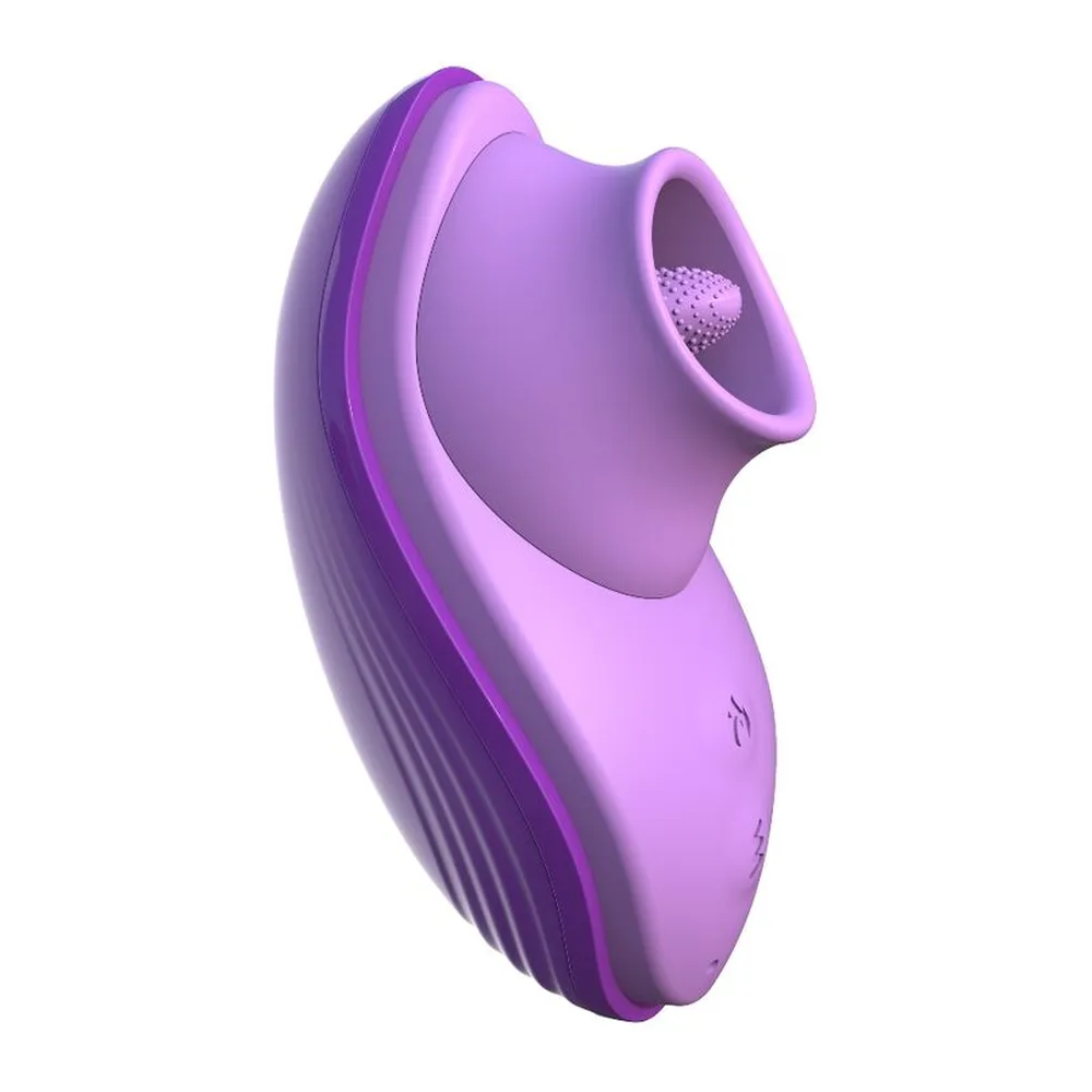 Stimulateur clitoridien en silicone violet, de forme ovale arrondie avec une ligne centrale, sur fond blanc
