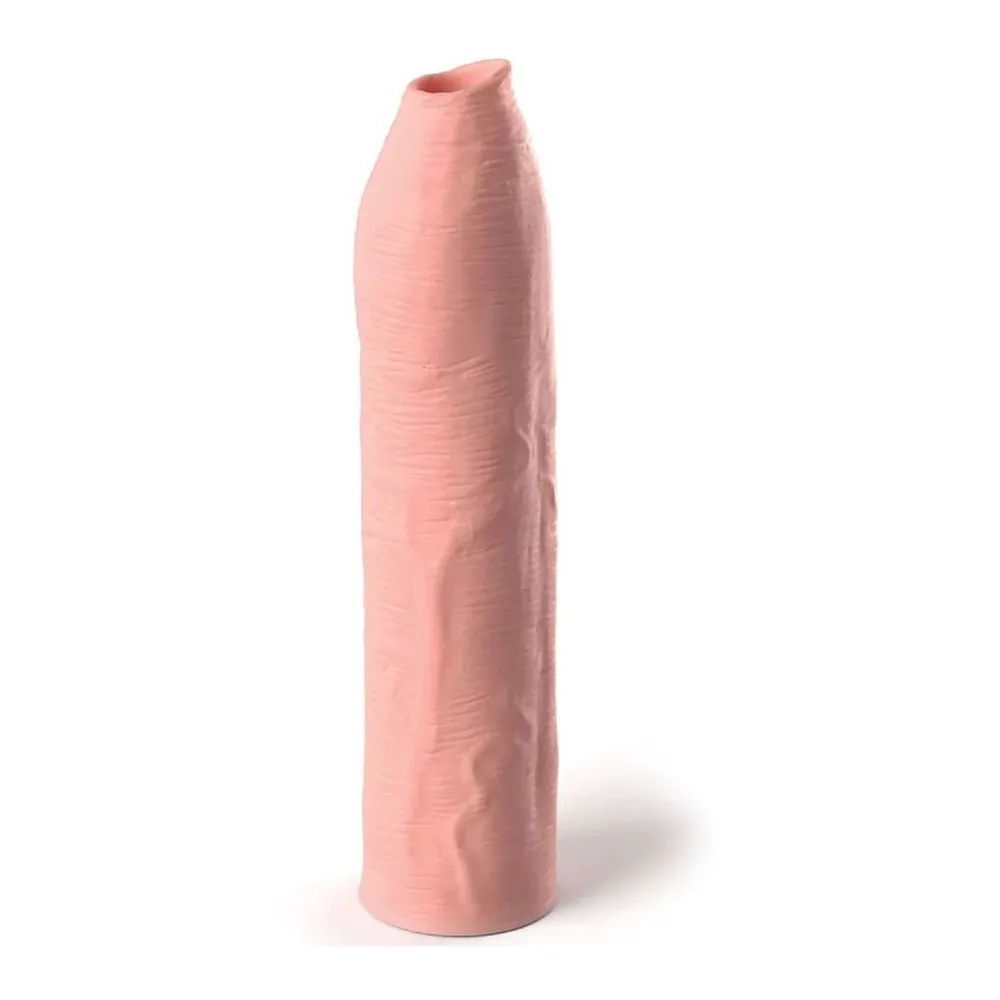 Gaine en silicone rose chair, forme cylindrique allongée avec ouverture au sommet, texture lisse, sur fond blanc