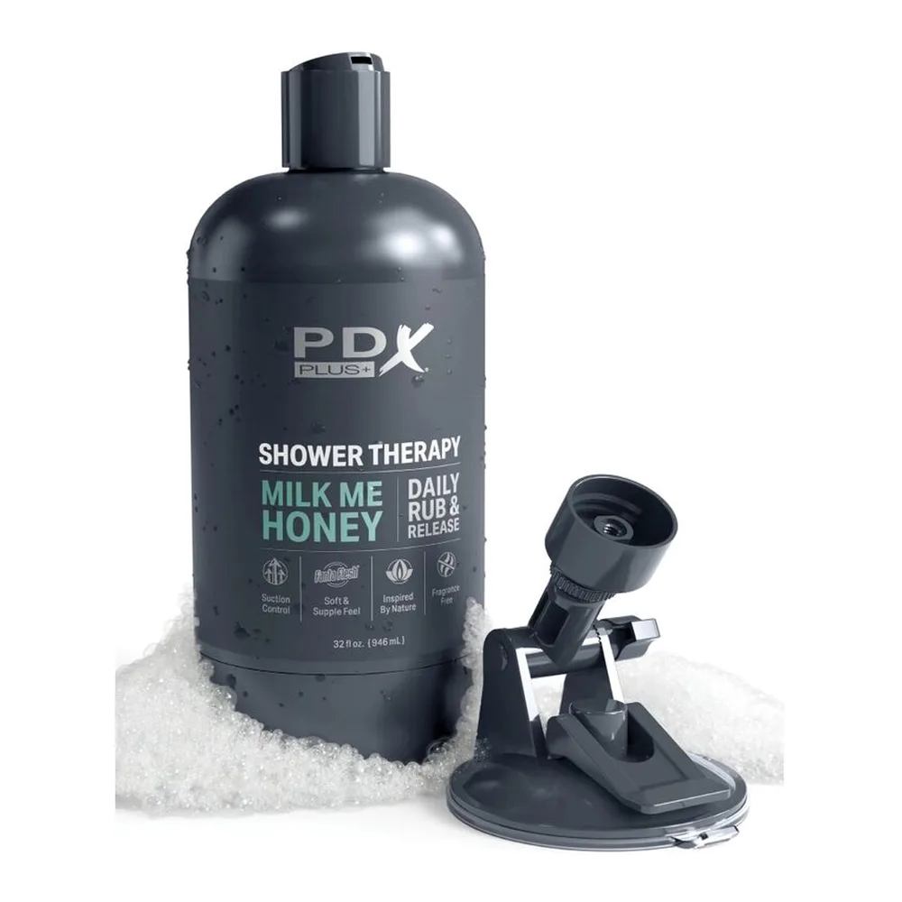Flacon noir de gel douche PDK Plus Shower Therapy Milk Me Honey, 340 ml, avec étiquette grise et capuchon noir, sur fond blanc