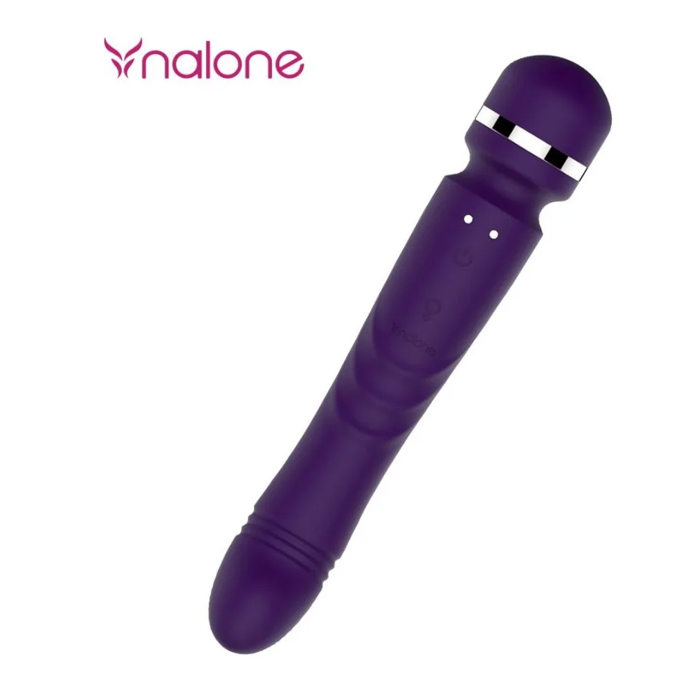 Masseur double tête en silicone violet avec têtes arrondies aux deux extrémités, tige centrale lisse et bande blanche près de la tête supérieure, sur fond blanc