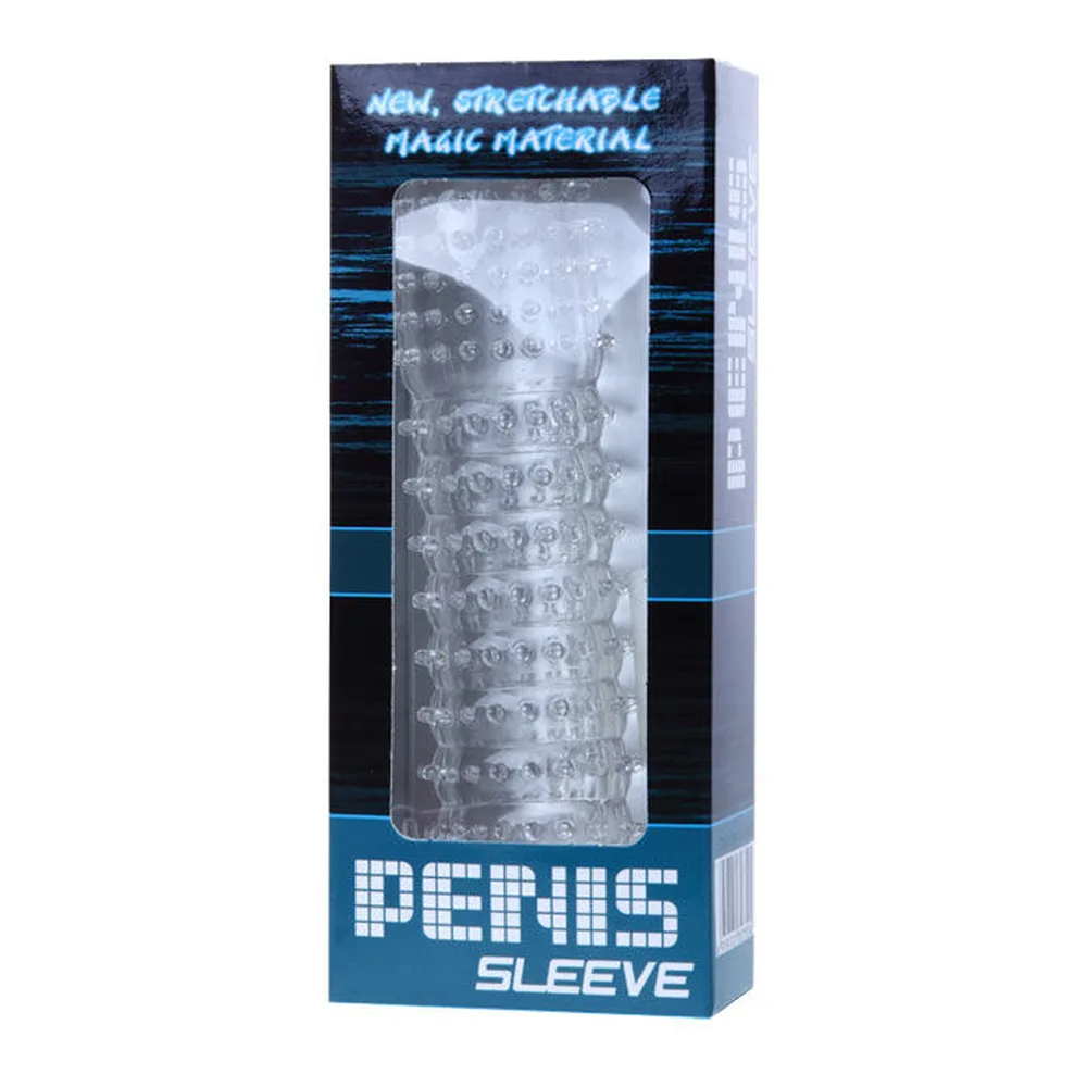 Gaine pénienne en silicone transparent hérissée de picots en relief sur toute la surface, base élargie avec ouverture centrale, sur fond blanc