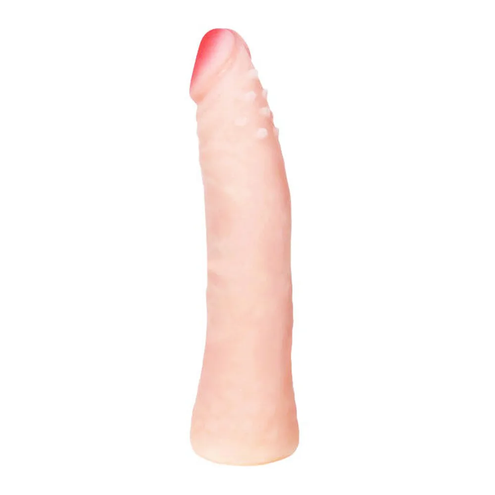 Gode en silicone de couleur rose chair avec dégradé plus foncé en haut, forme réaliste et lisse sur fond blanc