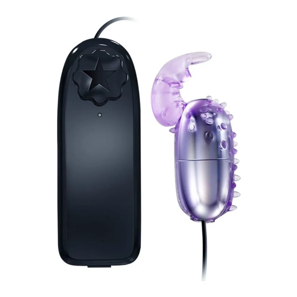 Vibromasseur œuf en silicone violet avec extensions texturées, cordon noir, à côté de sa télécommande noire en forme d'étoile sur fond blanc