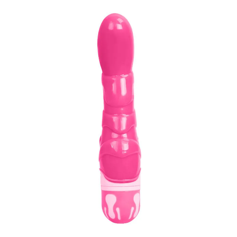 Vibromasseur rose fuchsia à relief texturé, forme anatomique arrondie, détails blancs sur la base, sur fond blanc
