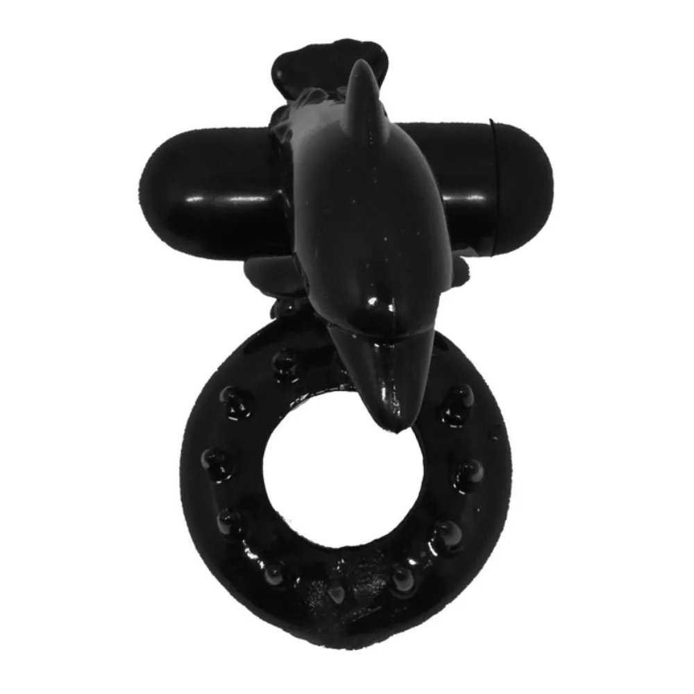 Stimulateur clitoridien noir en silicone en forme de dauphin, avec anneau pénien intégré et picots de stimulation, sur fond blanc