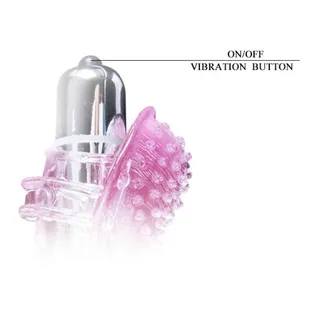 Doigt vibrant rose translucide avec motifs texturés, accompagné d'une capsule vibrante argentée, sur fond blanc. Bouton on/off visible en haut