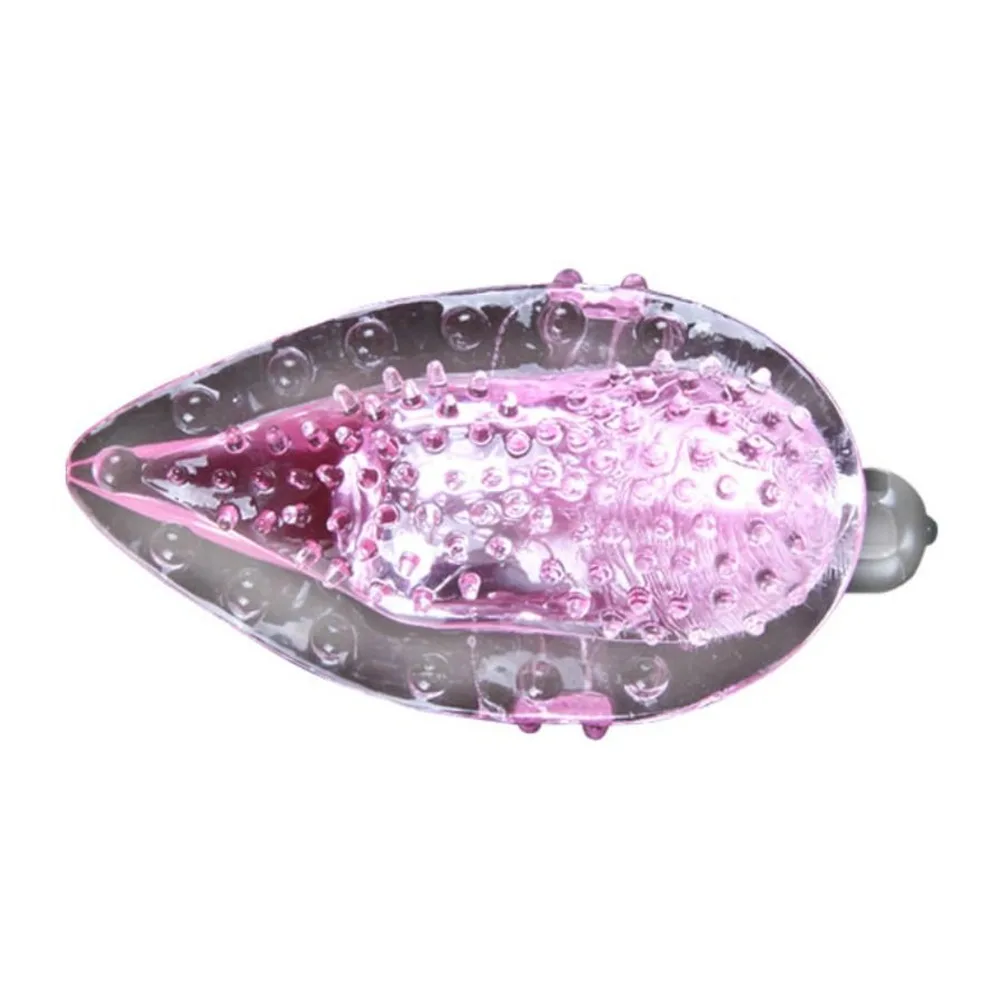 Doigt vibrant rose translucide avec motifs texturés, accompagné d'une capsule vibrante argentée, sur fond blanc. Bouton on/off visible en haut