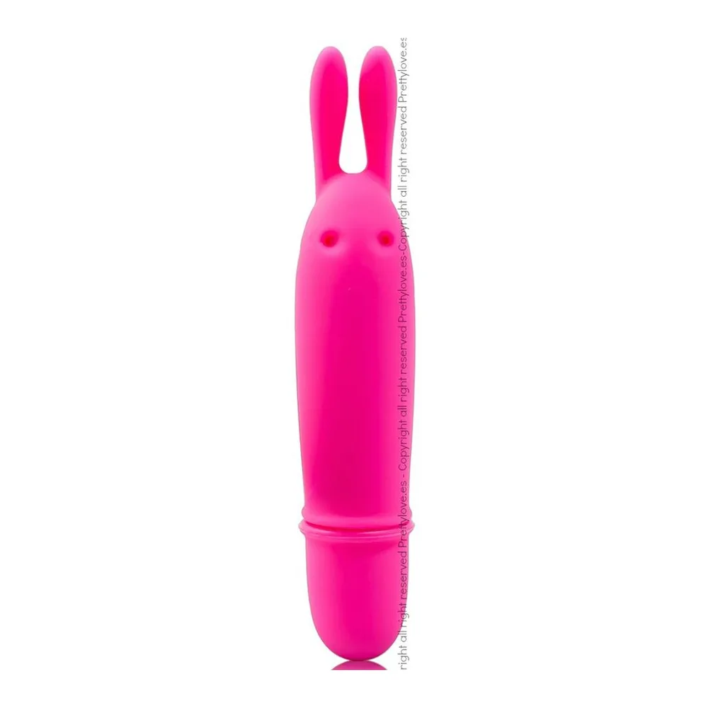 Stimulateur clitoridien rose fuschia en silicone, forme de lapin avec deux oreilles allongées, corps cylindrique et tête arrondie avec détails de visage