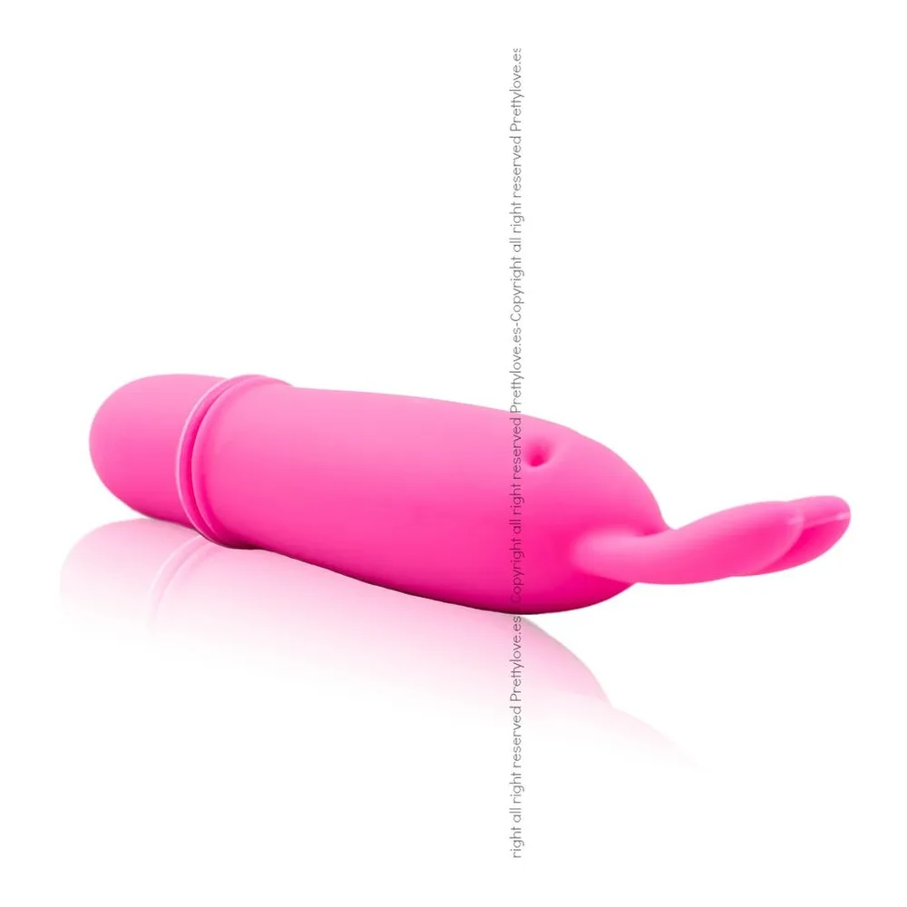Stimulateur clitoridien rose fuschia en silicone, forme de lapin avec deux oreilles allongées, corps cylindrique et tête arrondie avec détails de visage