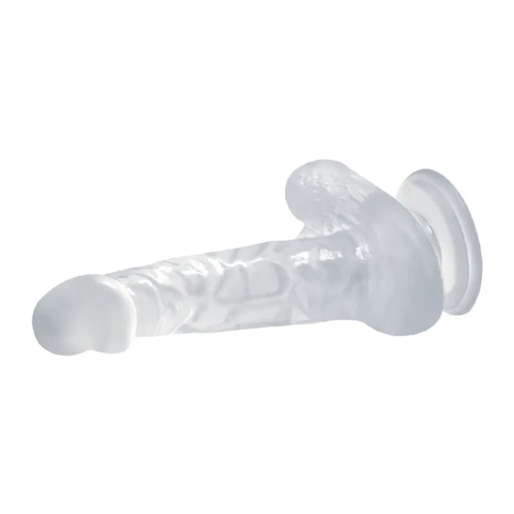 Gode réaliste en gélatine transparente avec base ventouse et détails anatomiques, sur fond blanc