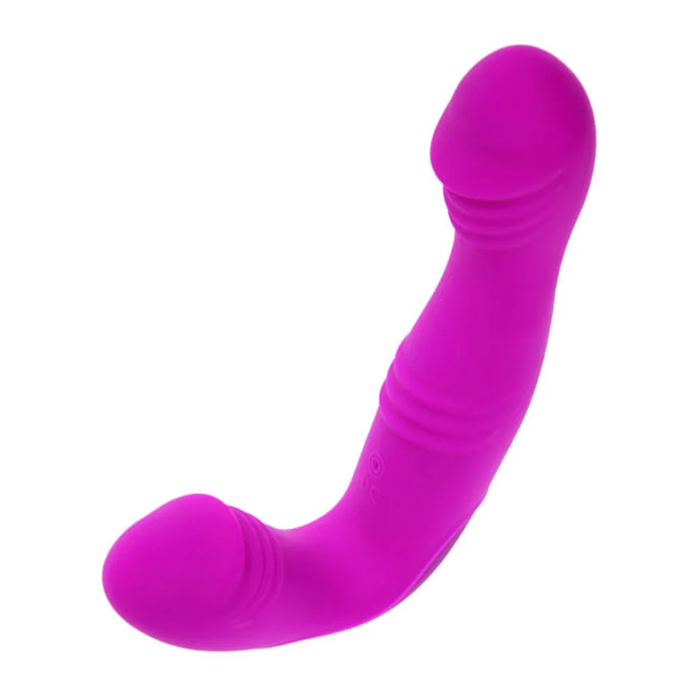 Strap-on rose fuchsia en silicone avec une extrémité courbe destinée à la pénétration et une base arrondie de maintien interne, sur fond blanc