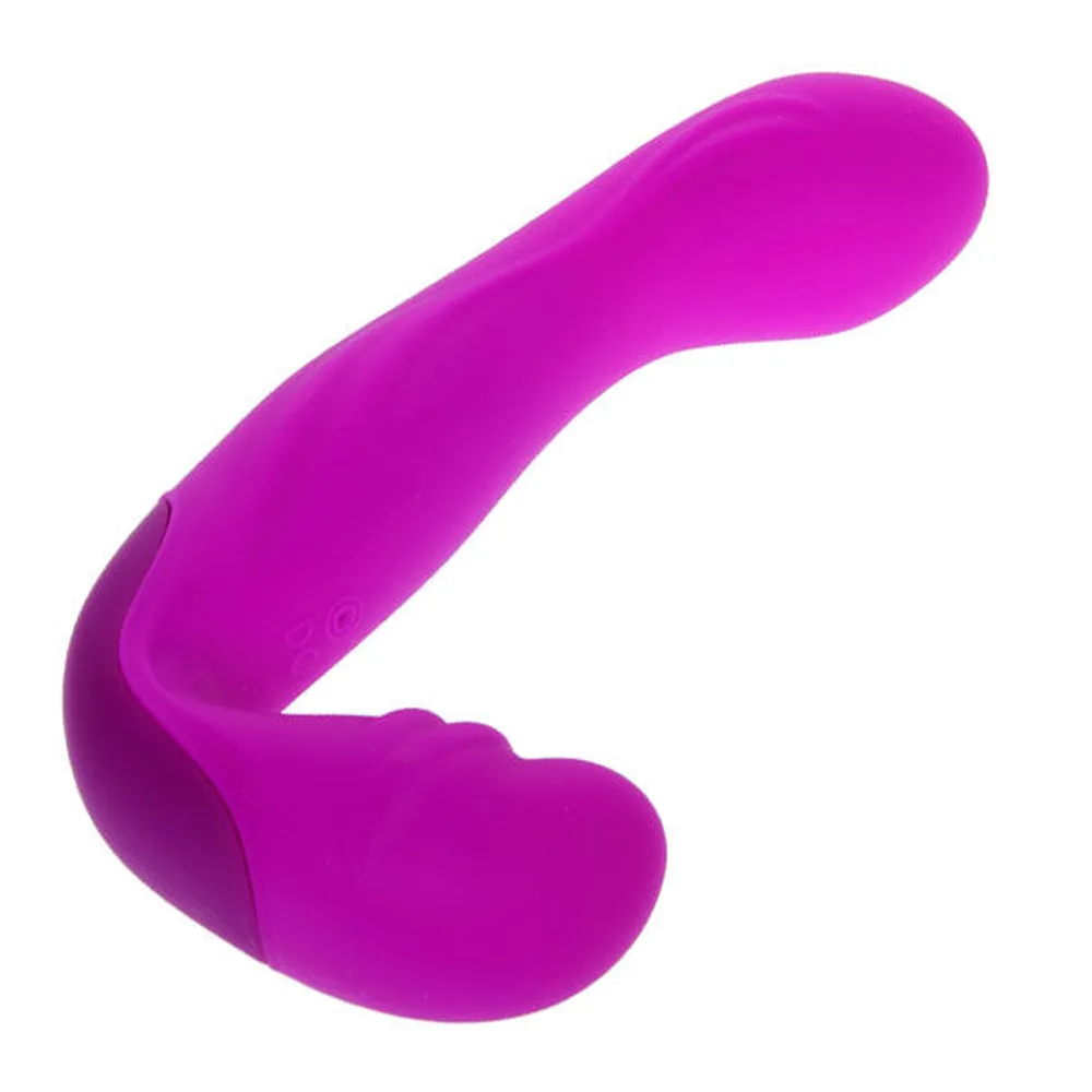 Gode-ceinture courbé en silicone magenta avec extrémité bulbeuse, forme ergonomique sur fond blanc
