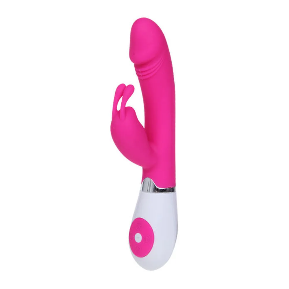 Vibromasseur rabbit rose fuchsia et blanc avec bras clitoridien bifide, commande vocale intégrée dans la base, sur fond blanc
