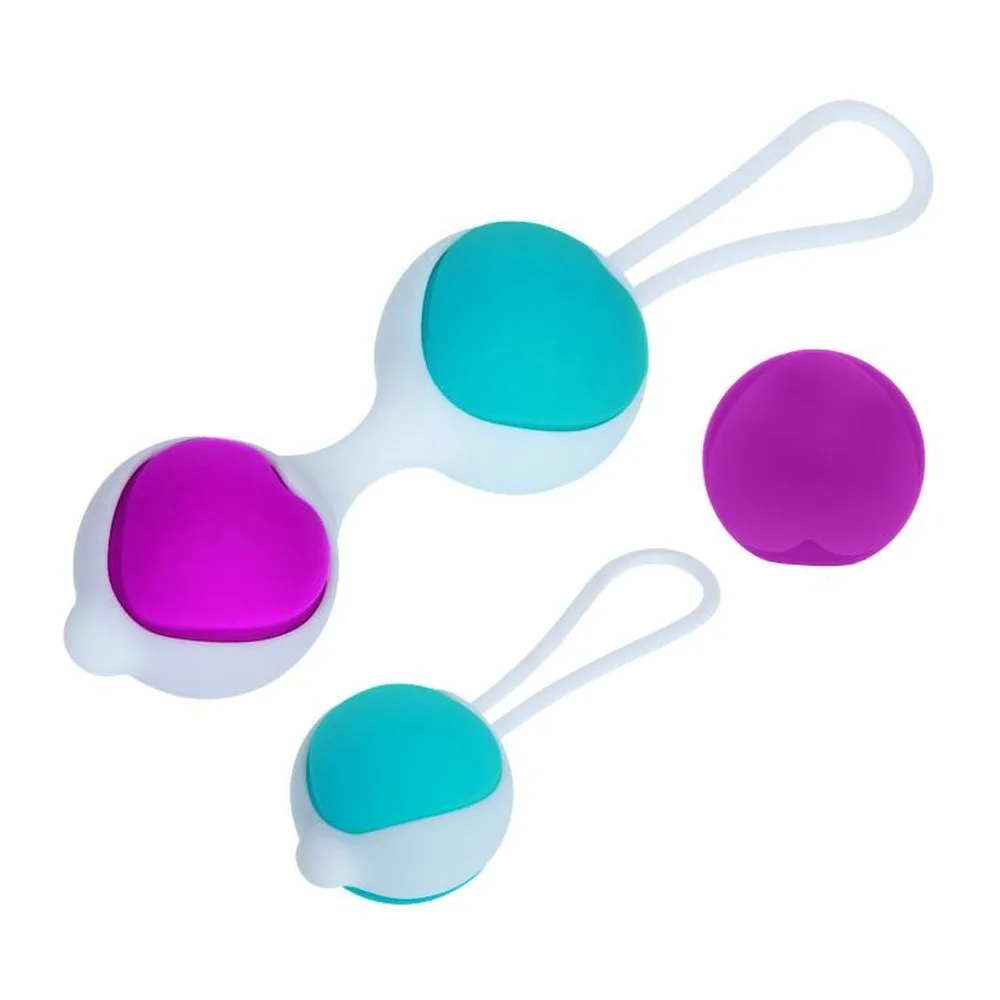 Ensemble de boules de Geisha en silicone : deux avec cordelette turquoise, une turquoise et une fuchsia avec tige, et une grosse boule fuchsia détachable