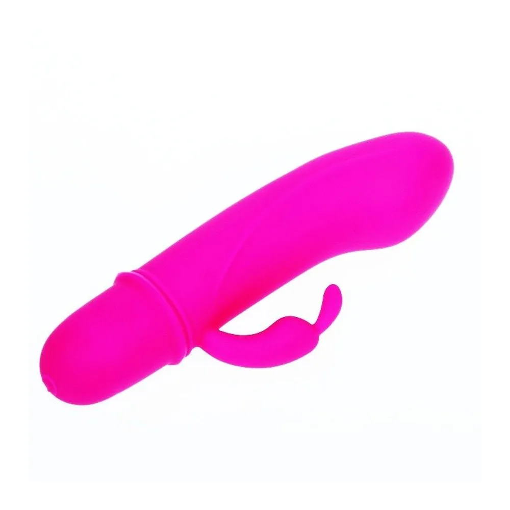 Vibromasseur rabbit rose fuchsia de 12,7 cm présenté de deux angles : vue complète et détail du mécanisme interne avec batterie visible