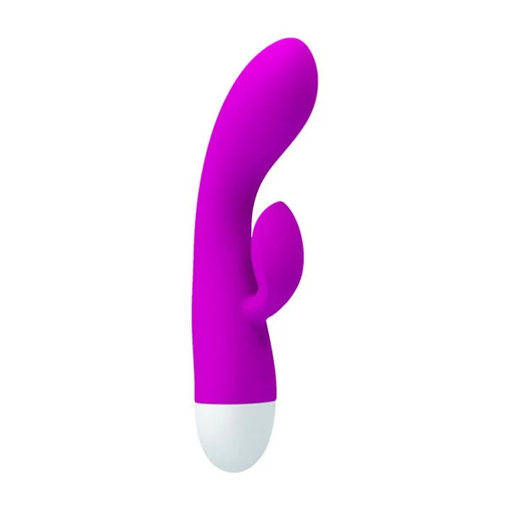 Vibromasseur en silicone magenta avec embout blanc, forme épaulée, sur fond blanc
