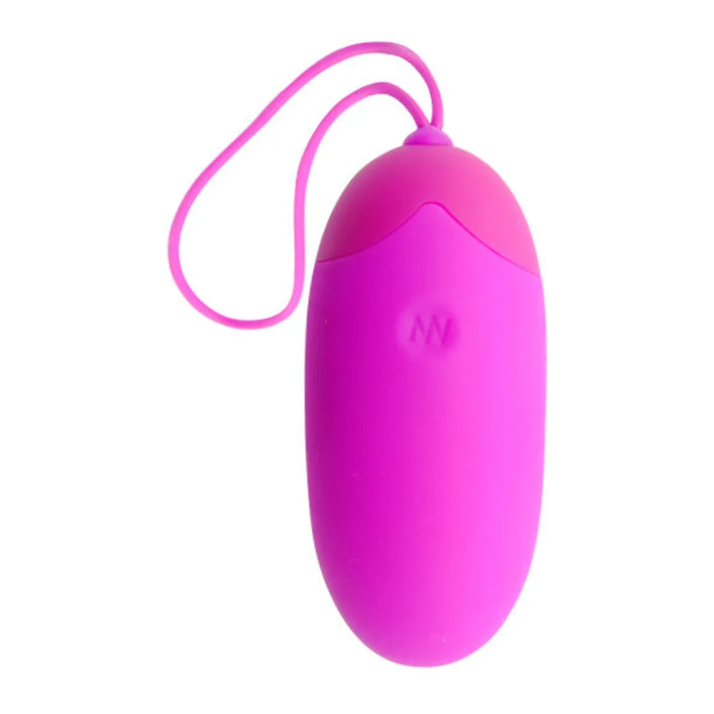 Œuf vibrant rose fuchsia avec télécommande sans fil rose assortie, cordon de transport rose, capot gris clair métallisé
