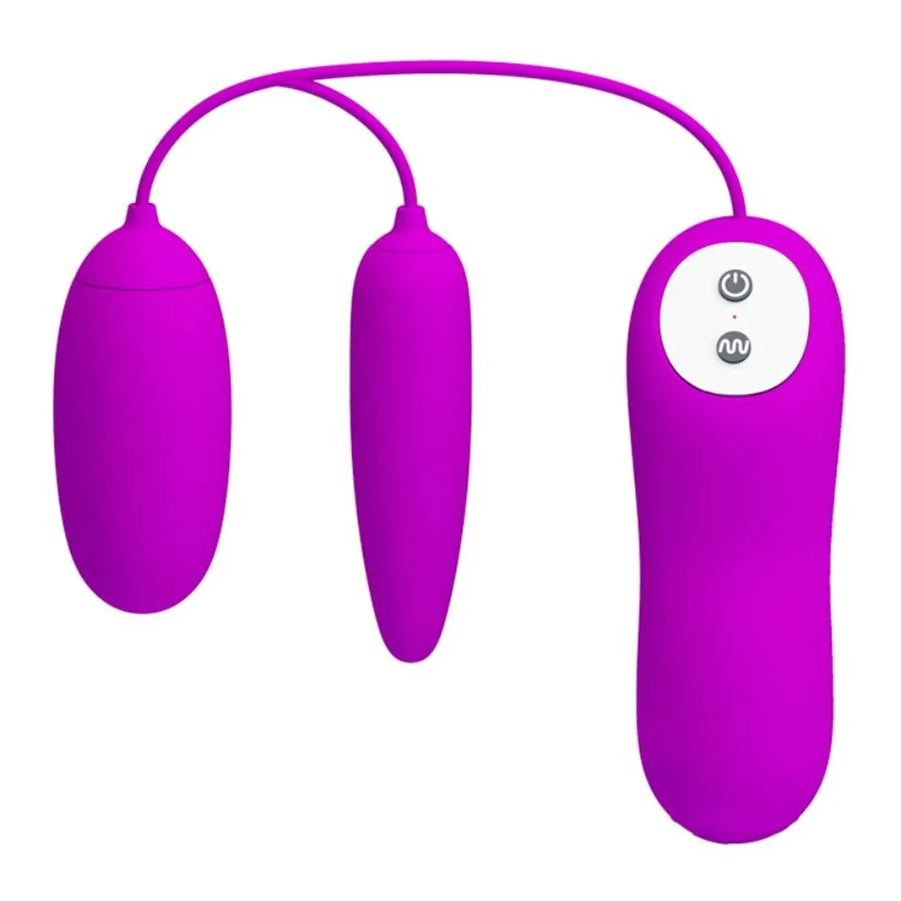 Œuf vibrant violet avec deux œufs reliés par un câble à un boîtier de commande violet doté de deux boutons, sur fond blanc