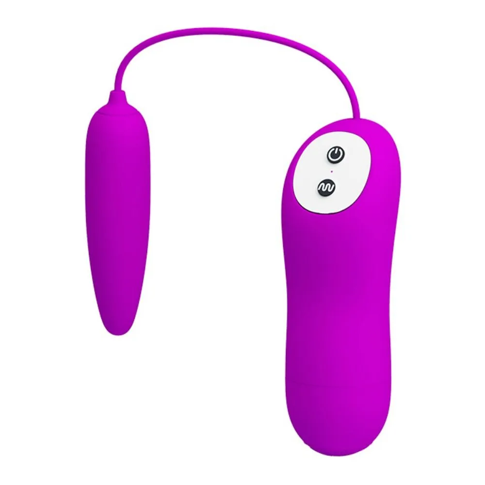 Stimulateur magenta avec télécommande filaire, bouton marche/arrêt et sélecteur de vibration visibles sur le contrôleur blanc intégré en haut