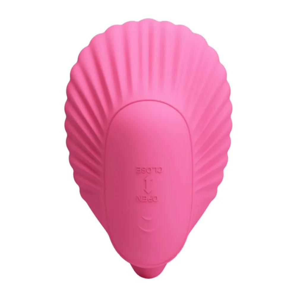 Vibromasseur rose en silicone avec tête incurvée et nervurée, accompagné de sa télécommande sans fil dotée de deux boutons de contrôle