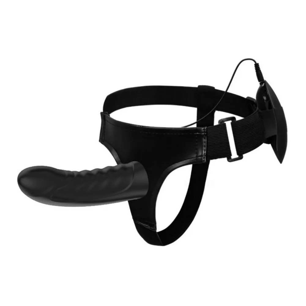 Gode-ceinture noir avec harnais ajustable affichant un insert creux vibrant, présenté sur mannequin neutre de couleur beige