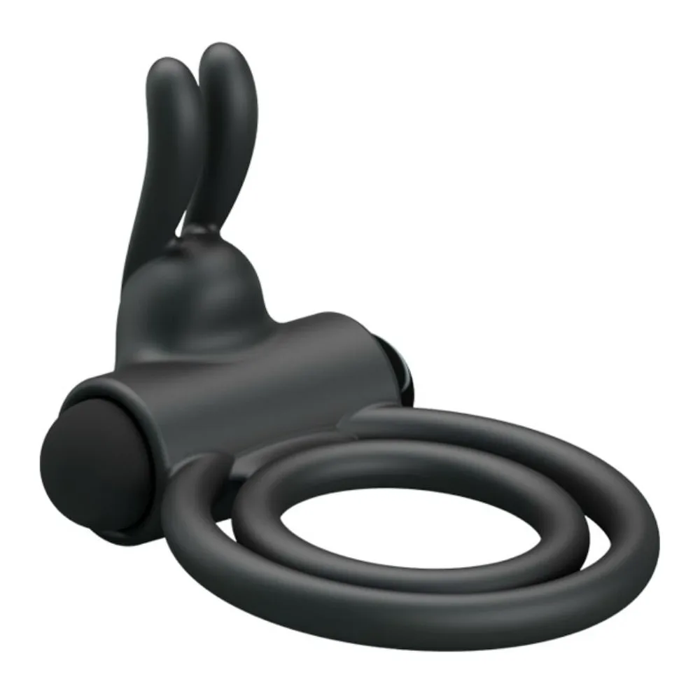 Cockring noir en silicone avec deux anneaux reliés et deux oreilles souples sur le dessus, sur fond blanc