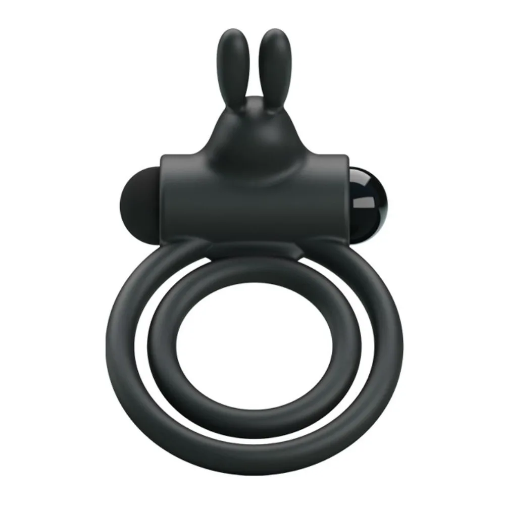 Cockring noir en silicone avec deux anneaux reliés et deux oreilles souples sur le dessus, sur fond blanc