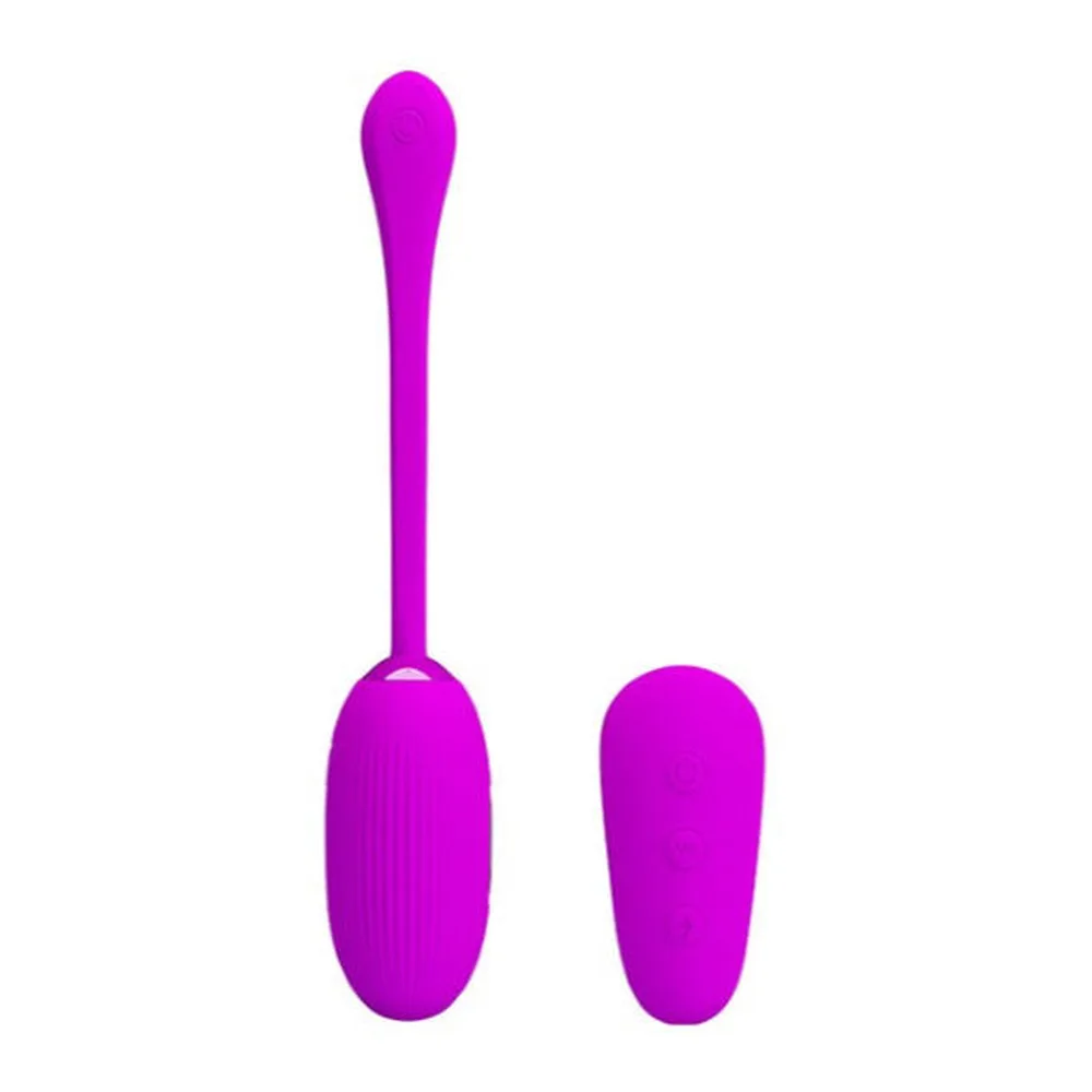 Œuf vibrant rose magenta avec long manche assorti, doté d'une prise de recharge métallique visible sur la face avant, sur fond blanc