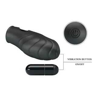Schéma technique du vibromasseur de doigt en silicone noir avec reliefs torsadés, montrant le manchon principal, le bouton de commande circulaire et la télécommande filaire avec bouton ON/OFF