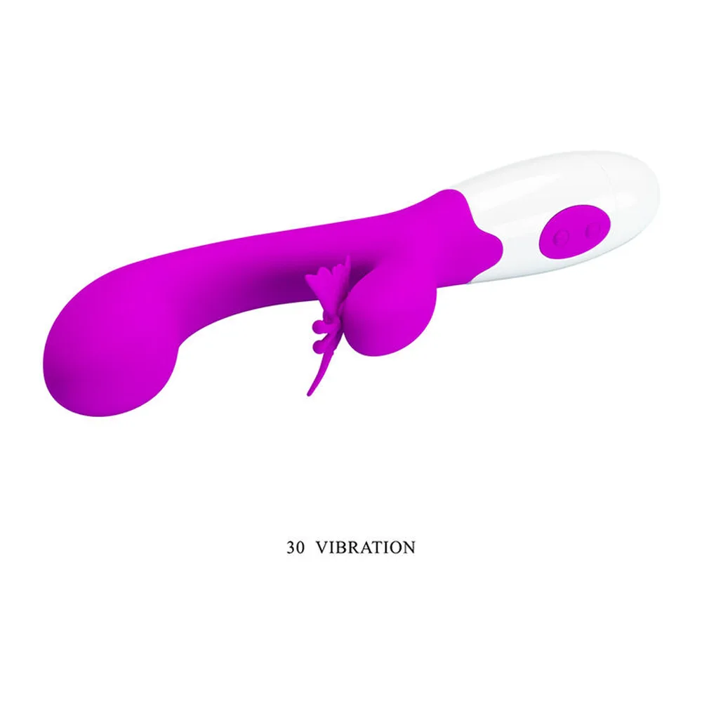 Vibromasseur rabbit en silicone magenta et blanc avec bras clitoridien papillon, mécanisme visible et capuchon de protection blanc, fonctionnant avec piles AAA
