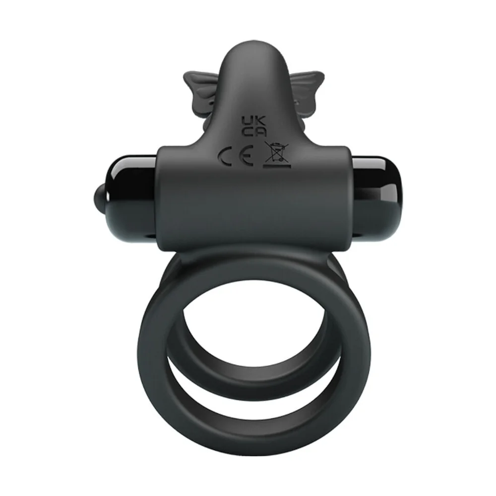 Anneau vibrant noir en silicone avec stimulateur papillon intégré et moteurs latéraux, sur fond blanc