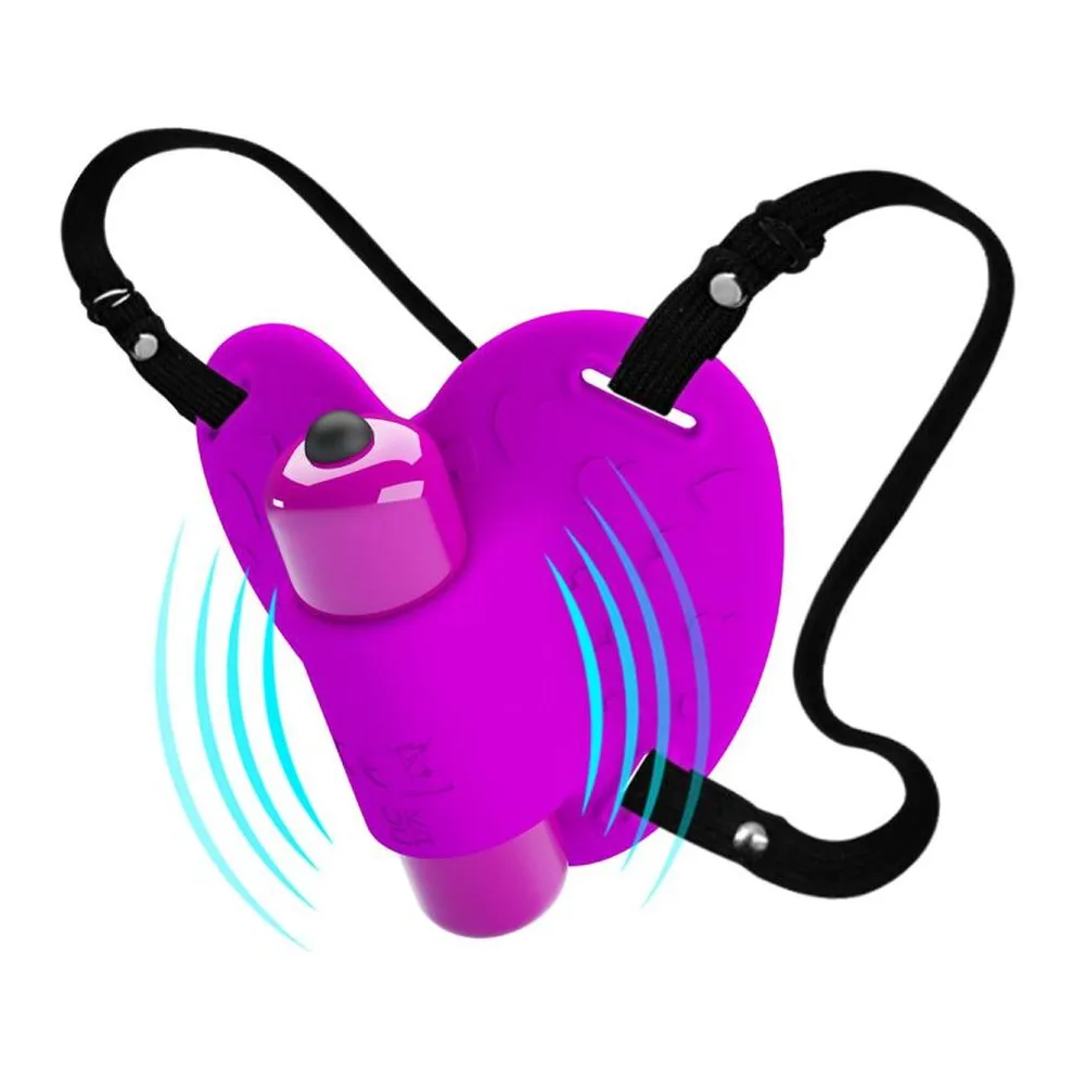 Stimulateur clitoridien en silicone rose fuchsia avec bille vibrante, poignées noires ergonomiques et motifs de vibrations turquoise visibles