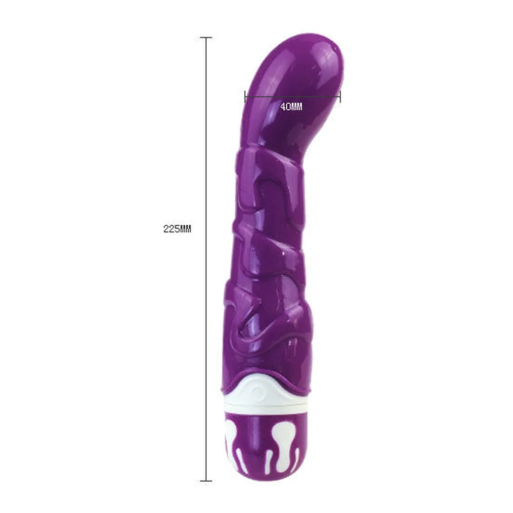 Vibromasseur en silicone violet avec tête arrondie et motifs texturés en spirale, bague de maintien blanche et mauve à la base, sur fond blanc