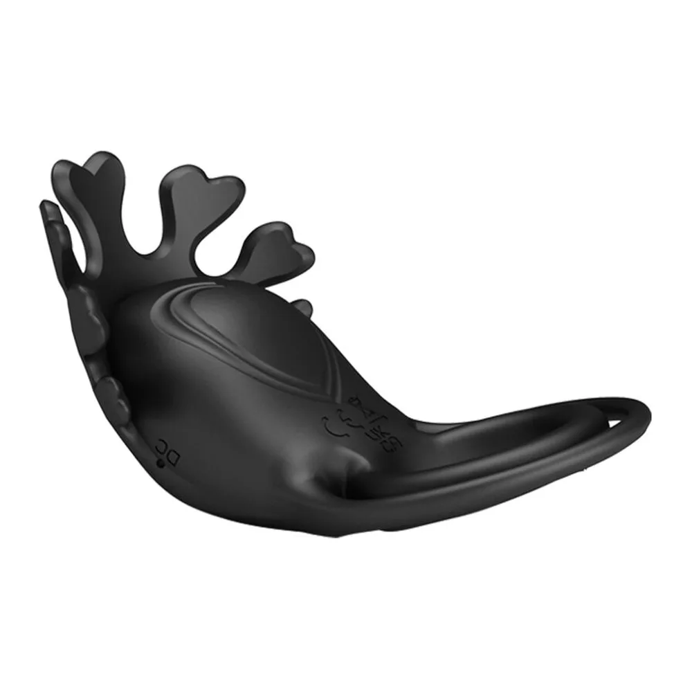 Anneau vibromasseur noir en silicone avec bras articulés relevés sur le dessus et anneau de maintien, fond blanc
