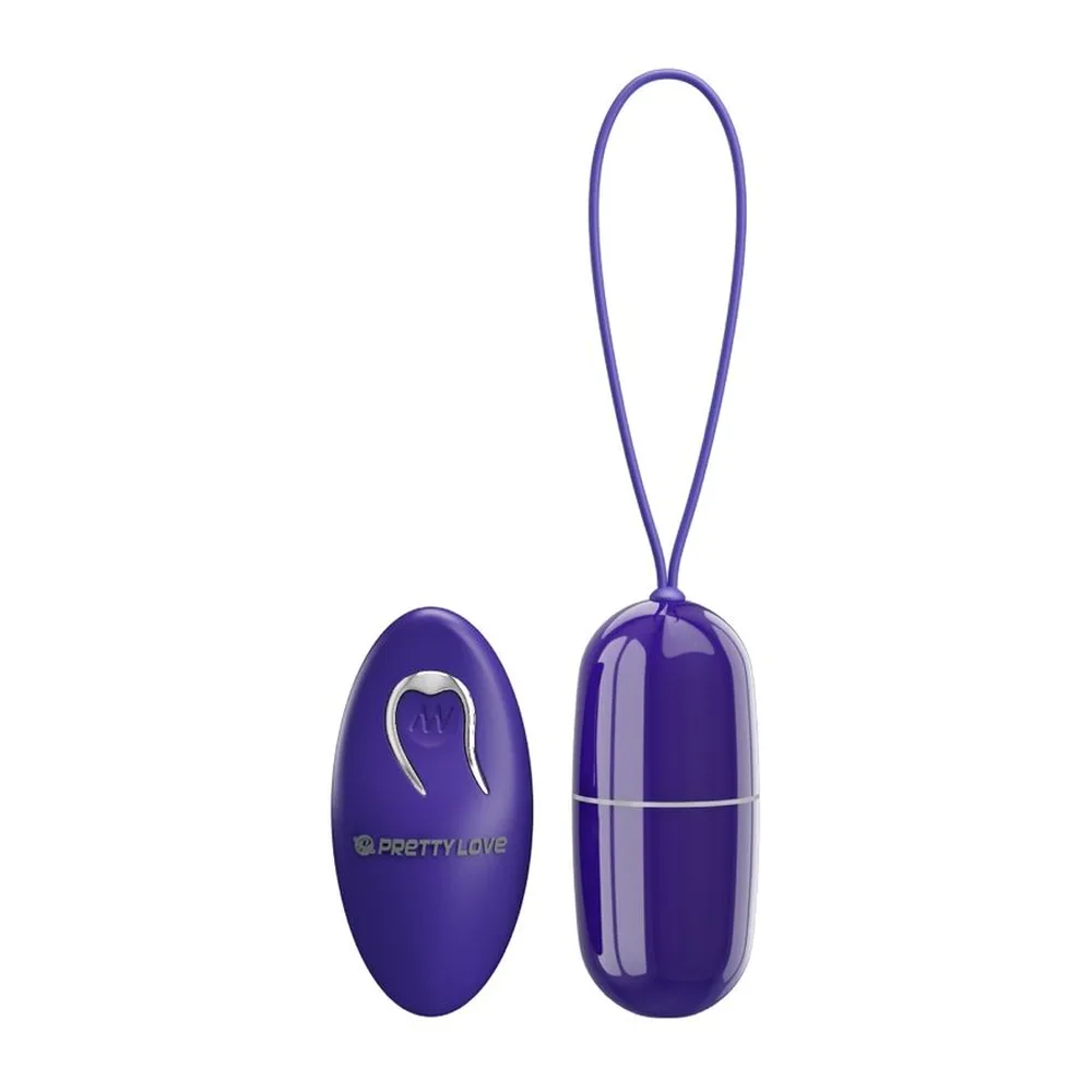 Œuf vibrant violet avec lanière de suspension et télécommande radio violet en forme de goutte, tous deux en plastique brillant