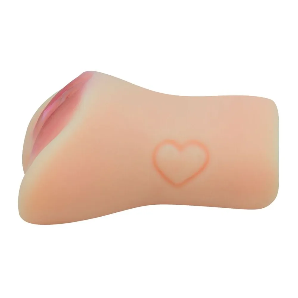 Masturbateur en silicone beige clair avec deux orifices, intérieur rose, détail cœur gravé sur la surface, effet froid
