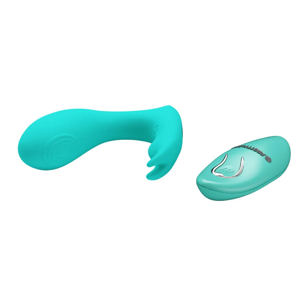 Sextoy en silicone violet avec forme ergonomique incurvée, dotée d'une base élargie, présenté sur fond blanc