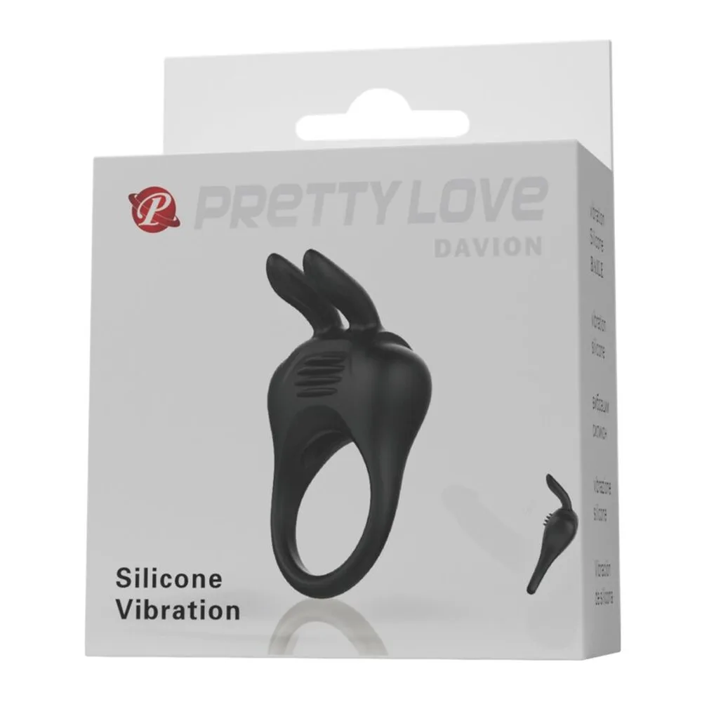 Bague vibrante noire en silicone avec oreilles de lapin, accompagnée de son œuf vibrant amovible, sur fond blanc