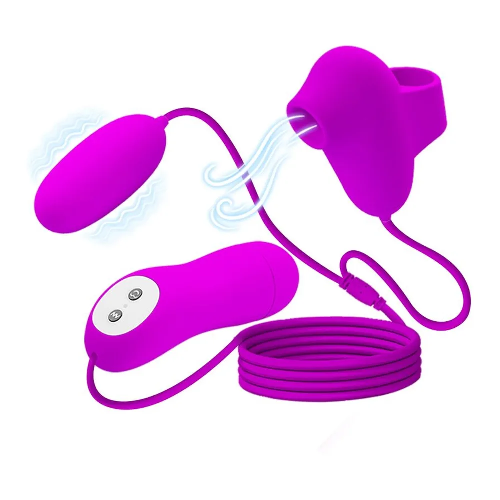 Stimulateur clitoridien en silicone rose magenta composé d'un œuf vibrant, d'une ventouse et d'un boîtier de commande filaire avec deux boutons de contrôle