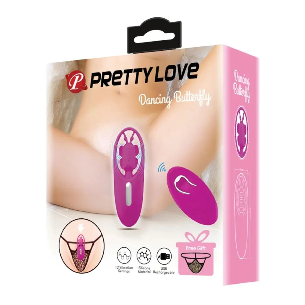 Stimulateur papillon rose magenta avec ailes ajourées, présenté avec câble USB de recharge et télécommande ovale rose assortie, batterie AAA visible