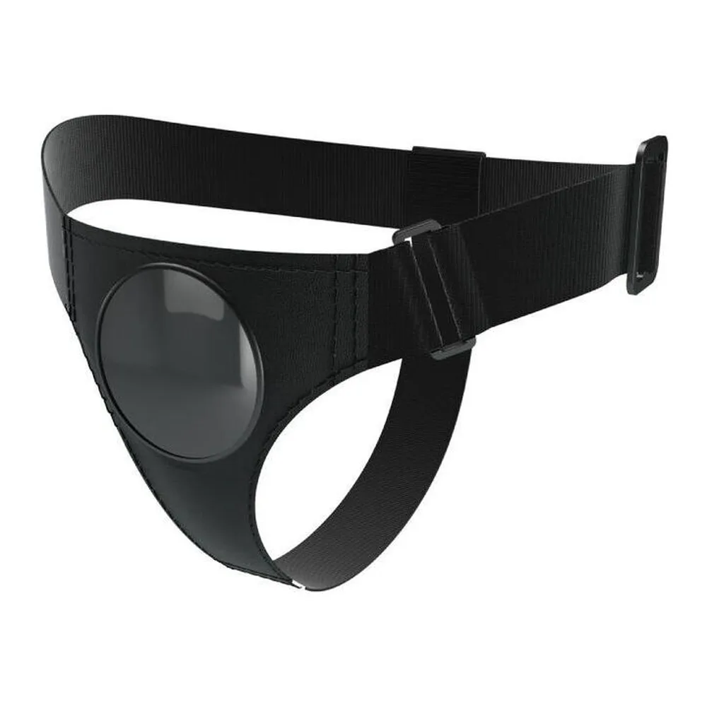 Harnais-slip noir en tissu extensible avec anneau de maintien circulaire et sangle ajustable, vue de trois-quarts sur fond blanc