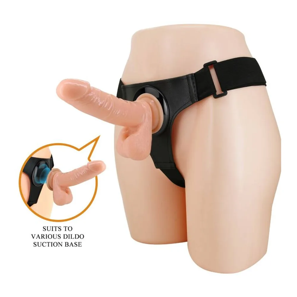 Harnais universel noir avec sangle réglable et boucle, compatible avec différentes bases de succion, montré avec gode réaliste chair sur mannequin, schéma d'adaptation en incrustation