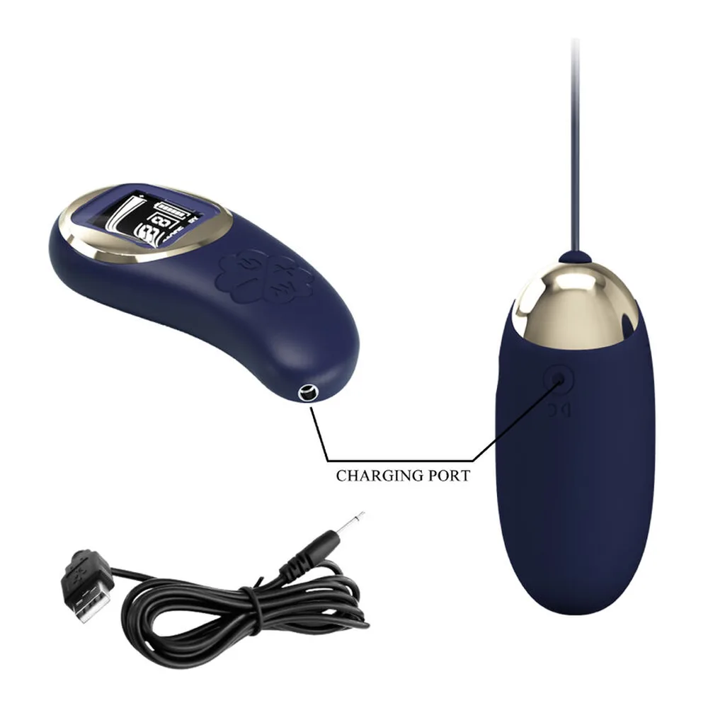 Télécommande bleu marine avec écran numérique affichant les modes TX/RX, boutons ON/OFF et SPEED +/-, et bouton vibration texturé en relief