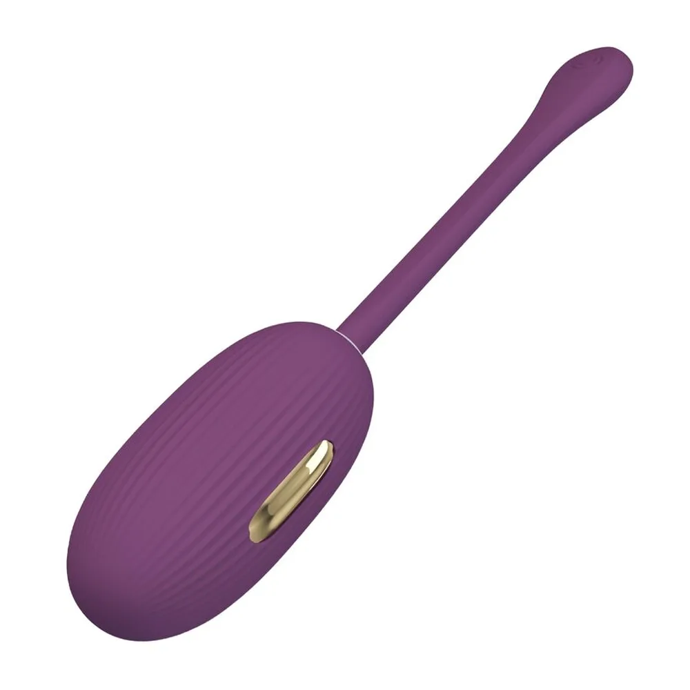 Œuf vibrant rose pâle avec handle allongé et arrondi, dotée d'une zone de commande sur le côté, corps lisse sur fond blanc