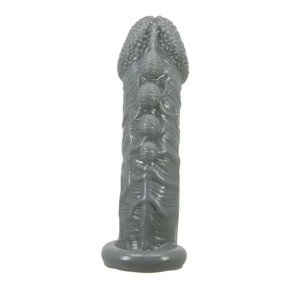 Manchon pénien en silicone gris anthracite avec gland texturisé en relief et veines en relief sur le fût, base plate et large